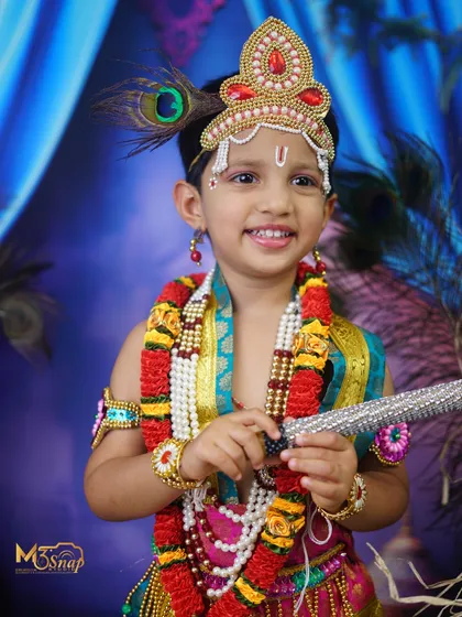 Celebrating our traditions is so important. I offer special photoshoots for festivals like Janmashtami, dressing up your little ones as Krishna or Radha. These shoots are full of joy and vibrant color.