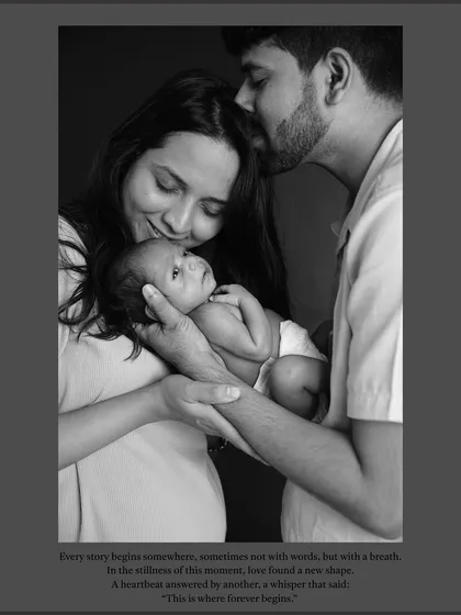 There is something so pure and timeless about a black and white newborn portrait. This image focuses on the tender connection between new parents and their baby. It's a quiet, emotional moment that shows the beginning of a new family story, captured forever.