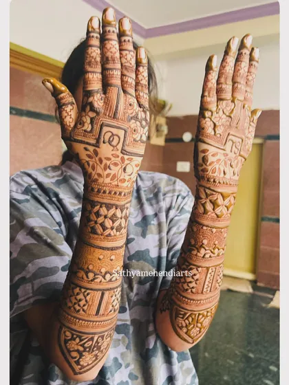Another view of the beautiful engagement mehendi, showing the full design on both arms.