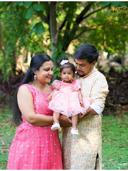 Family portraits are truly special to me, tumba ishta! This outdoor family photoshoot captures a moment of pure connection and happiness. I always aim for these natural, candid shots that reflect a family's true bond, creating memories that feel authentic and full of love.