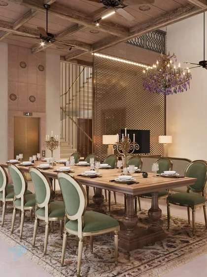 A formal dining space within the Banaras haveli, where heritage is felt in every texture. The design combines a rustic wooden ceiling and a traditional rug with elegant seating and a dramatic chandelier, creating a perfect setting for memorable gatherings.