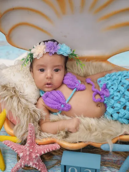 Let's create some magic. This little mermaid theme is one of my favorites. I love bringing fantasy worlds to life for your baby, with handmade outfits and detailed setups.