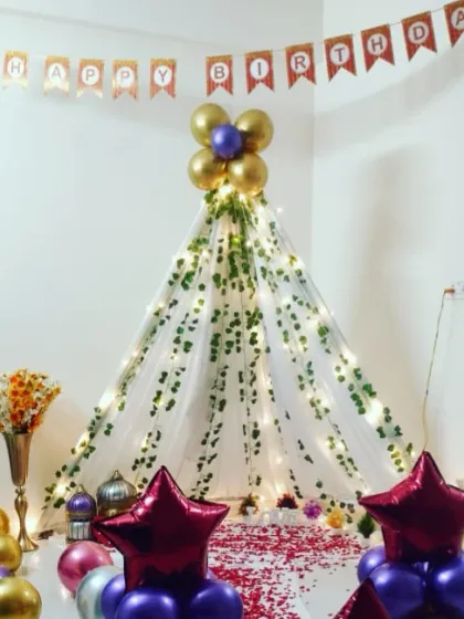 Even small, intimate celebrations at home can be magical. I designed this cozy teepee tent setup for a birthday surprise, complete with fairy lights, a birthday banner, and soft petals on the floor. It’s a perfect little escape for a special day.