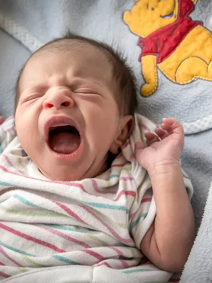There is nothing more precious than the first few weeks of life. In my newborn photography sessions, available in Indore, I focus on capturing these fleeting moments with a gentle touch, like this tiny, perfect yawn that holds a world of dreams.