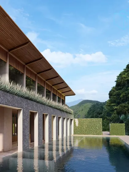 For this resort in the Himalayan foothills, I designed a space where architecture and nature merge. The infinity pool reflects the surrounding greenery, while the structure's clean lines and natural materials create a sanctuary of modern, biophilic luxury.