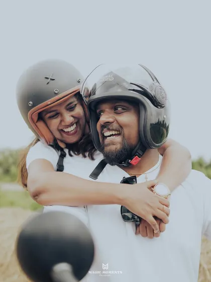 For adventurous couples, a pre-wedding shoot is all about capturing your personality. This candid shot from a biker-themed session shows the pure, unposed joy of just being together.