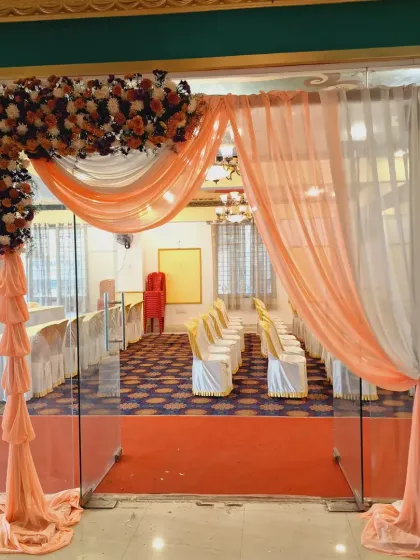 I design elegant entrances with custom floral arrangements and fabric draping that can be matched to your company's brand colors, setting a professional and welcoming tone for any corporate function.