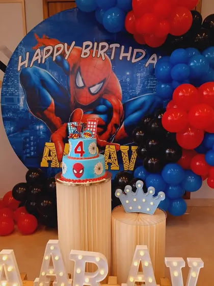 For all the little superhero fans, I create action-packed themes like this Spiderman birthday party. The setup features a dynamic backdrop with the iconic character, a balloon garland in Spidey's colors, and custom cake plinths, making the birthday boy feel like a true hero.