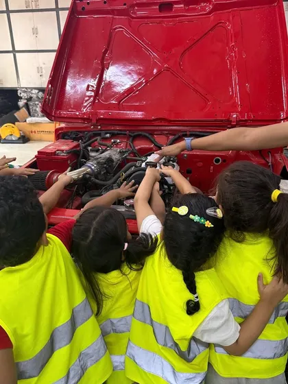 Learning isn't confined to a classroom. On our Adventure Days, we take learning into the real world. Here, our Kindergarteners get a hands-on look under the hood of a car, sparking countless questions about how things work. These experiences make learning tangible, memorable, and incredibly exciting.