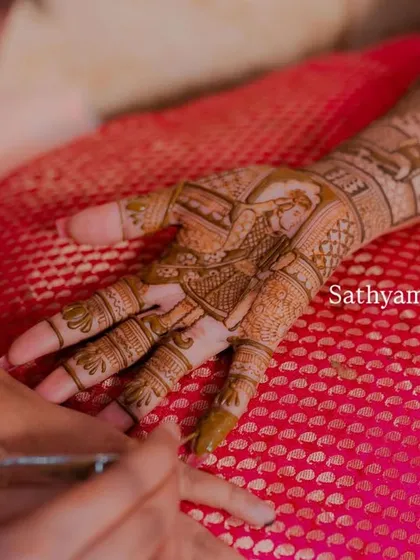 A close-up shot of me applying a storytelling mehendi design for an engagement. The process itself is a relaxing and pampering experience.