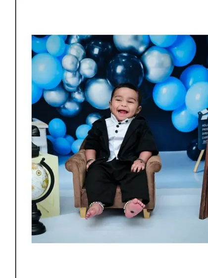 Dressed up in a tiny suit, this little gentleman is all smiles for his half-birthday milestone shoot. I offer sessions for more than just first birthdays, celebrating every step of their journey.